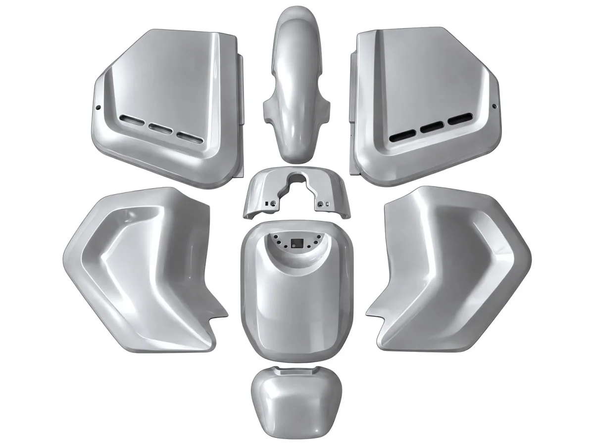Silver-gray plastic housing assembly in multiple orientations, used for multi-angle robot vision inspection